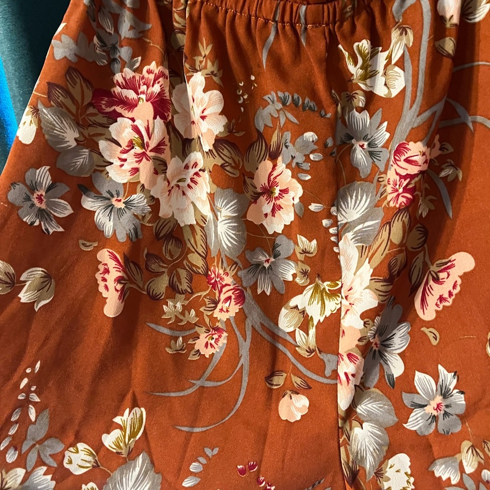 Two strapless Rompers